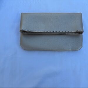 Neiman Marcus golden leather fold over clutch